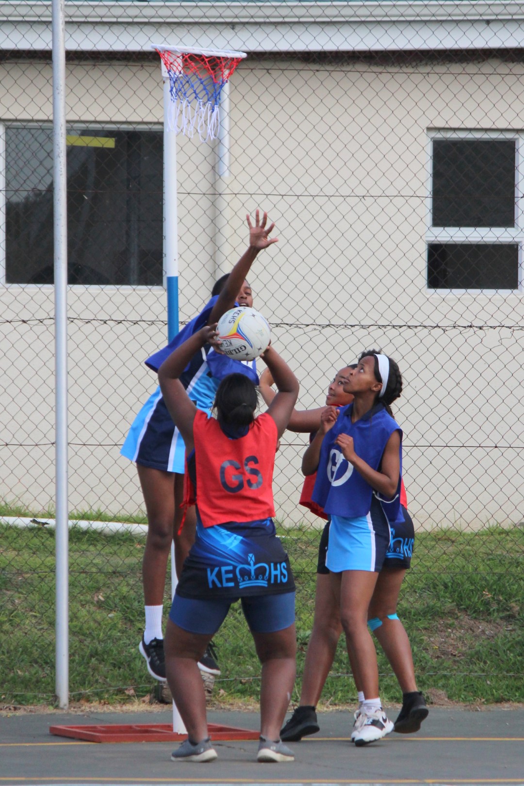 1st Netball team in action against KC