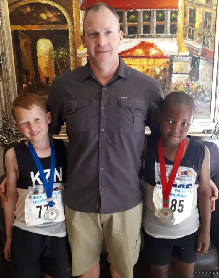 Caleb and Trevor with Mr Sweetnam their Turbo Javelin coach