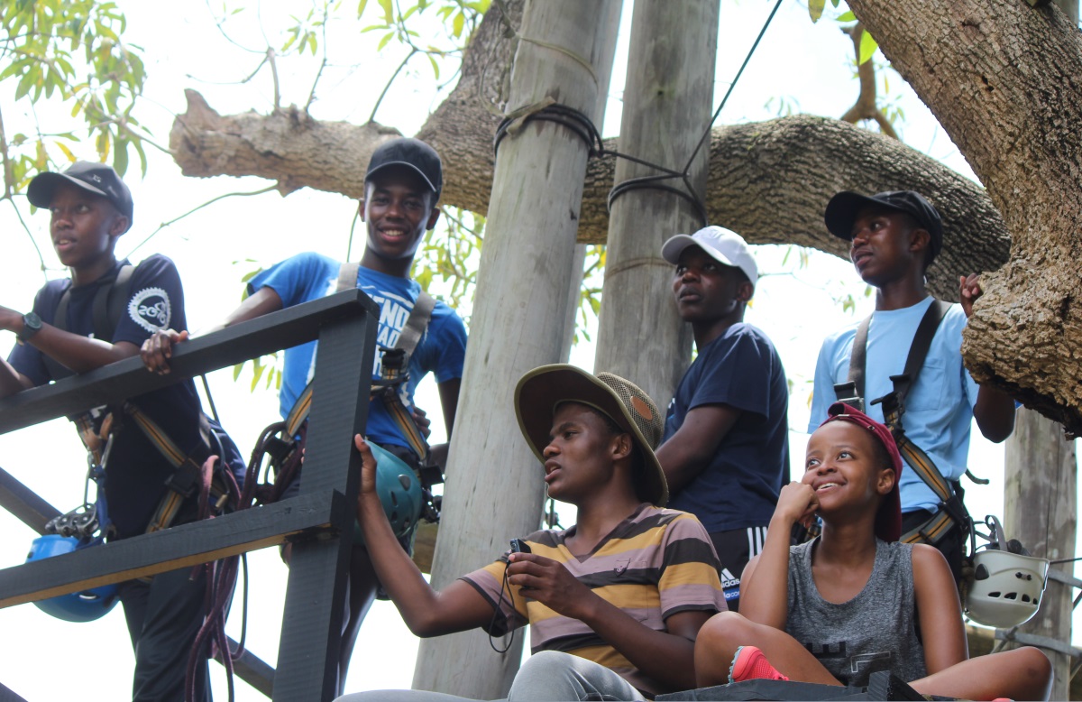 Grade 12 Prefects waiting their turn to zip line