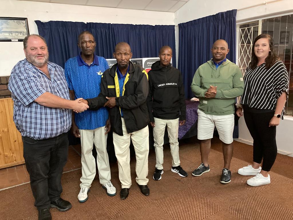 Mr Harrison Ms McArthur with KEHS Golf Day winners S Jackson P Nyamakazi L Manyana M Nondabula