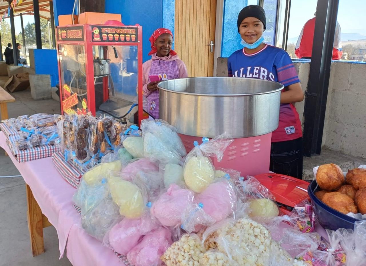 Owam and Talia at their stall