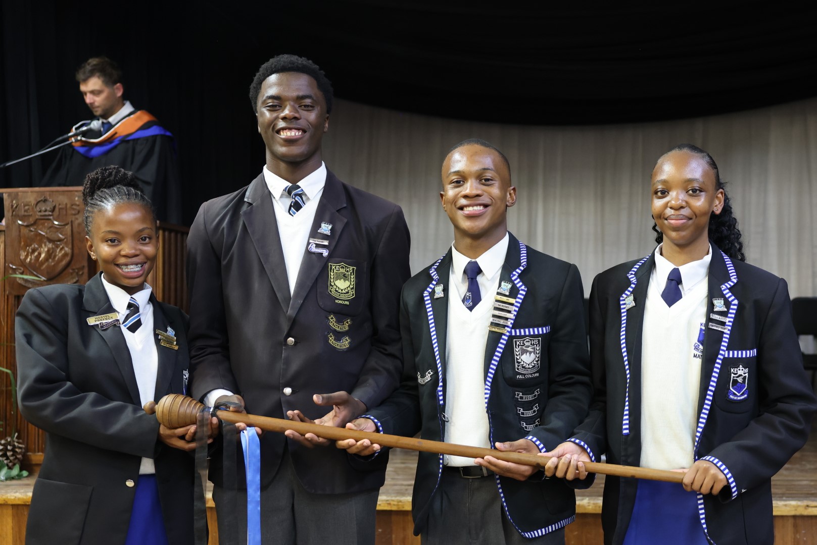 The 2026 Head Boy and Head Girl hand over the mace of authority to the 2027 Head Boy and Head Girl copy